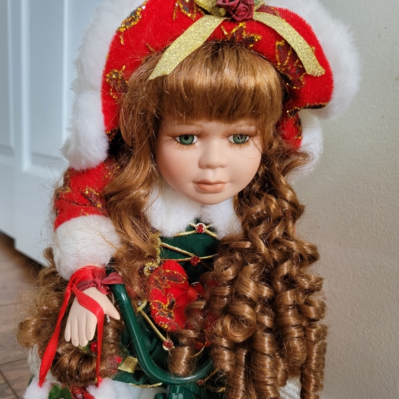 Vintage Porcelain doll on bike - Picture 1 of 3